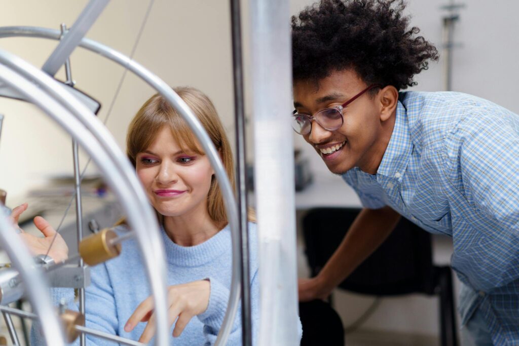 Man and a Woman Looking at an Experiment Together